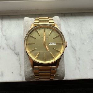 NIXON Sentry gold colored watch